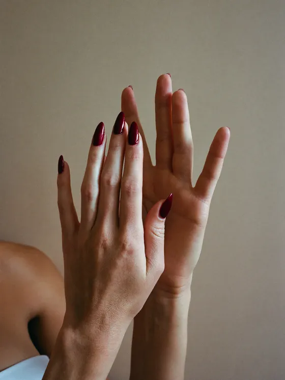 Nails in a saturated glossy oxblood burgundy