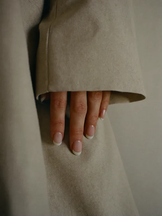 Nails in a sheer milky translucent nude